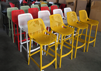 Vente en gros Fauteuil évidé jaune empilable patio jardin extérieur chaises en plastique polypropylène