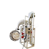 Machine automatique de décorticage, d'épluchage et d'élimination des graines de tournesol