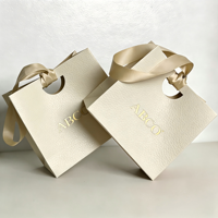 Sac en papier d'emballage cadeau de luxe personnalisé avec logo imprimé, respectueux de l'environnement, pour bijoux, cosmétiques, bougies, parfums, boutiques