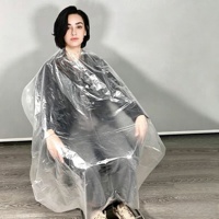 Cape de barbier jetable transparente et imperméable en plastique PE, bavette de coiffure pour salons de coiffure