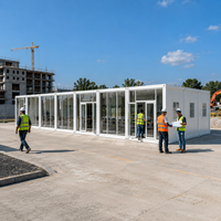 Maison conteneur détachable clé en main à structure en acier avec verre trempé pour grand bureau de chantier 40 pieds avec salle de bain intégrée