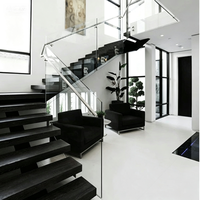 Escalier droit sur mesure de luxe avec poutre centrale dissimulée et marches en marbre/bois pour villa