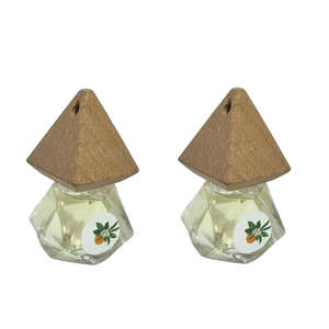 Ambientador de Coche Colgante de Cristal con Aceite Esencial de Canela de 7 ml, Desodorante y Refrescante con Fragancia Natural - Product Image 1