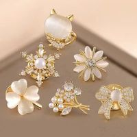 Broches en cuivre et zircon en forme de fleur, élégantes, pour femmes, pour mariage, fiançailles, fête, cadeau, accessoires vestimentaires