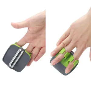 Smart Kitchen Gadget Stainless Steel hand vegetable peeler palm peeler finger grips with cover