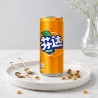 Boisson gazeuse Fanta très vendue, saveurs orange, raisin, pêche, pomme verte, canette mince de 330 ml, sans conservateurs