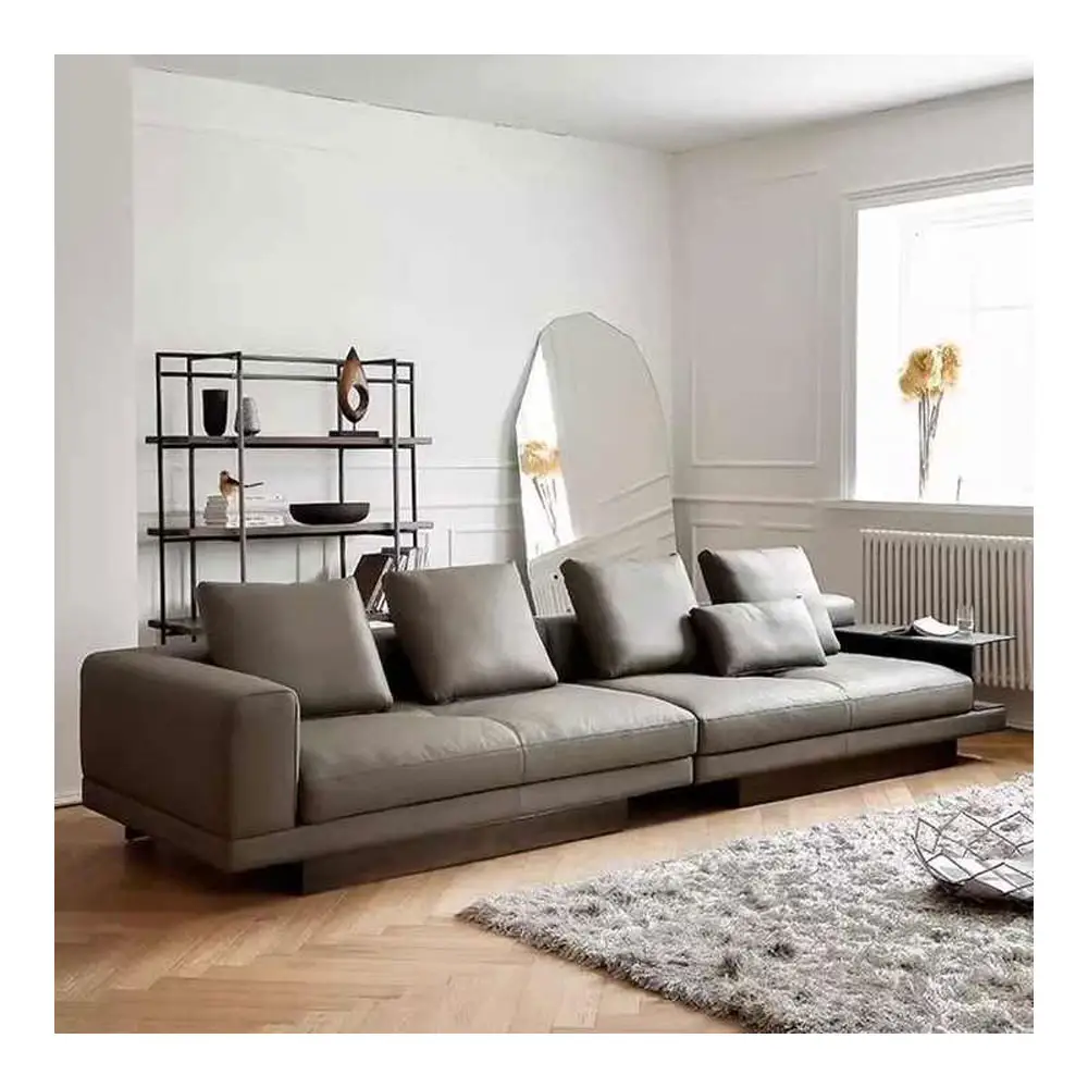 أريكة فاخرة إيطالية من الجلد بتصميم بسيط يمكن ترتيبها إلى صف مستقيم ومكونة من أربعة مقاعد مناسبة لغرفة المعيشة