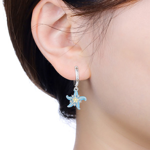 Boucles d'oreilles en forme d'étoile de mer en cuivre blanc plaqué argent avec pierres de zircon pour femmes, bijoux mignons à la mode - Product Image 2