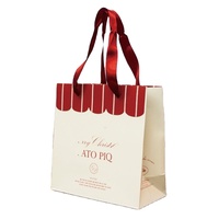 Penjualan langsung pabrik Logo merek kustom tas kertas kemasan perhiasan Premium dapat digunakan kembali dengan pegangan katun