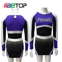 Tenue de performance Elite Cheer |   Uniforme de cheerleading violet, noir et argenté, à épaules dénudées, avec accents en strass et découpe au dos, service OEM