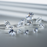 Certificat GRA Vente en gros Pierres de Moissanite créées en laboratoire, 1 carat, non montées, 6,5 mm, clarté VVS1, excellente taille, finition polie, jeu de couleurs/effet de feu