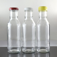 Botella de vidrio transparente Oshow de 8oz/12oz (500ml) con cuello de rosca continua 38-400 y tapa metálica con precinto de seguridad para salsa o agua