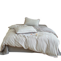Modernes Bedrucktes Frisches Baumwoll-Jacquard-Bettwäsche-Set mit Dreieckskanten-Design Vierteiliges Bettlaken- und Bettdecken-Set
