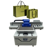 Multifunktions-6090-UV-Flachbettdruckmaschine für Handyhüllen, Glasflaschen, Stifte, PVC, Acryl, Keramik, Holz, Metall