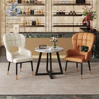 Fauteuil ergonomique moderne avec dossier creux et rembourré, chaise de salle à manger à dossier haut pour hôtel, villa, maison d'hôtes et restaurant