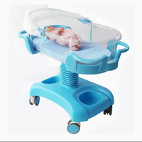 Lit d'hôpital nouveau-né durable en ABS et en métal avec réglages manuels et caractéristiques de berceau