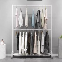 Présentoirs à vêtements pour magasins de vêtements pour hommes et femmes Cintres à double couche au sol qui peuvent être réglables