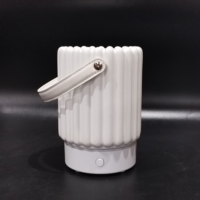 Diffuseur électrique ultrasonique en céramique couleur personnalisée avec poignée, humidificateur d'huiles essentielles, garantie 1 an, usage intérieur pour maison et bureau