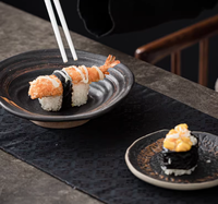 Assiettes plates japonaises uniques et modernes en argile noire pour servir, idéales pour les desserts, les sushis, les plats de restaurant