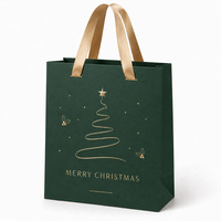 Sacs cadeaux de Noël verts élégants faits main et gaufrés, avec ruban plat en satin et motif doré, pour emballage de détail des fêtes