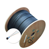Cable de fibra FTTH plano marca OWIRE g657a1 1km rollo 2 4 6 12 24 Core FRP fuerza plana FTTH Cable de caída de fibra óptica