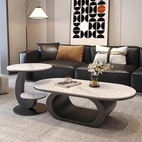 Ensemble de tables basses en pierre frittée avec cadre en fer noir, table d'appoint ronde, table centrale ovale, mobilier de salon minimaliste, décoration intérieure