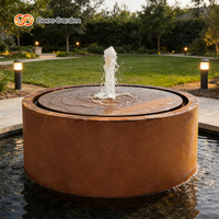 Fontaine d'eau ronde en acier corten rouillé