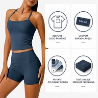 Ensemble 2 pièces sexy pour femme : Soutien-gorge de sport rembourré à dos croisé et short cycliste taille haute sculptant pour le fitness et le yoga