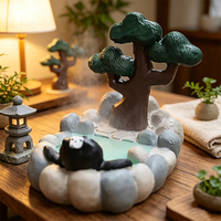 Großhandel Kawaii Tier-Fee-Liebe Pyramiden-Handyständer aus Harz, Onsen-Katze Desktop-Zubehör, Heimtisch-Dekoration, Geschenke