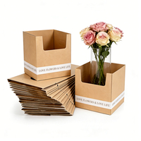 Ventes en gros de pots à fleurs en papier kraft ondulé portables personnalisés avec poignée pour arrangements floraux et emballages cadeaux