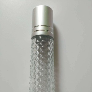 Botella de vidrio roll-on de 10 ml, cilindro dispensador cosmético transparente, botella vacía para aceite esencial - Product Image 1