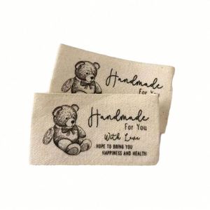 Étiquettes tissées en coton personnalisées en gros, faible MOQ 100 pièces, étiquettes pour vêtements - Product Image 5