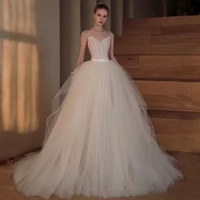 Robe de mariée en dentelle à bretelles spaghetti et col en V, avec nœud, en tulle à volants et grande traîne, style robe de bal