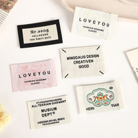L'usine d'étiquettes tissées personnalise les étiquettes de col de vêtements, les accessoires de vêtements, les étiquettes de col de vêtements, les étiquettes en tissu, les étiquettes principales