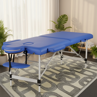 Nouvelle arrivée, lit de spa populaire, table de massage pliable portable noire, table de massage en aluminium, table de massage de salon