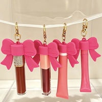 Porte-clés mignon avec capuchon en forme de nœud pour brillant à lèvres, brillant à lèvres végétalien, waterproof, longue tenue, hydratant, huile à lèvres marque privée