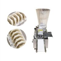 Machine à farcir et à emballer les tortellinis et les raviolis de différents poids