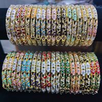 Bracelet tendance et luxueux en émail fin de 0,6 mm avec motif floral, incrustations de strass et motif ajouré pour femme - Vente en gros