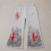 Fabricant de vêtements personnalisés OEM ODM : Pantalons de survêtement larges pour hommes, effet délavé vintage, imprimé graphique, style streetwear