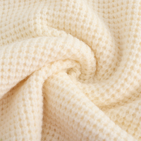 Cardigan en tricot gaufré à col en V pour femme, avec poches et bordure perlée, couleur crème ivoire, orné de perles cousues à la main, style veste-pull, pour marques privées