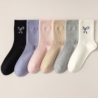 Chaussettes de sport en coton brodé en gros, logo brodé sur le mollet, chaussettes personnalisées pour femmes, chaussettes personnalisées