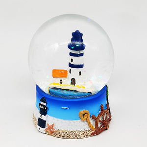 Produits de Chypre avec un design en forme de tortue, de dauphin, de gouvernail, de lézard, souvenir en résine, verre pailleté, globe à neige en verre de 45 mm, 65 mm - Product Image 1