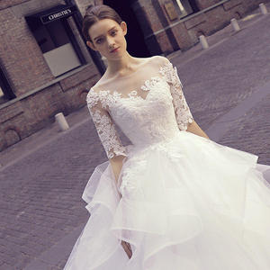 White Ball Gown Wedding Dress Sweetheart Neckline Tulle Empire Waist Floor Length Long Sleeve Bridal Dress - Product Image 2