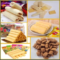 Promotion : Extrudeuse à double vis pour snacks fourrés, four de cuisson et mélangeur automatique haute capacité pour barres de riz soufflé au chocolat