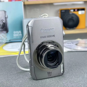 Mini Cámara CCD Portátil <span class=keywords><strong>Canon</strong></span> <span class=keywords><strong>IXUS</strong></span> 1000HS con Zoom 2x-7x, 10MP, Digital sin Espejo, Video Full HD, Pantalla LCD de 3.0 Pulgadas, Tarjeta SD - Product Image 1