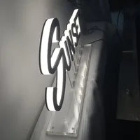 Lettres lumineuses LED personnalisées en acrylique fin avec éclairage frontal et bordure en acier inoxydable pour enseignes de restaurant moderne et affichage de marque en vitrine