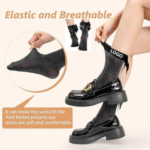 Chaussettes pour femmes à nœud pailleté <span class=keywords><strong>noir</strong></span> avec dentelle satinée et <span class=keywords><strong>bas</strong></span> métallique scintillant pour <span class=keywords><strong>un</strong></span> look girly - Product Image 2