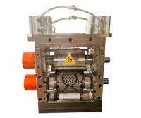 Cutter rotatif à rouleaux pour le découpage du contour extérieur des serviettes hygiéniques, destiné aux machines de fabrication de serviettes hygiéniques