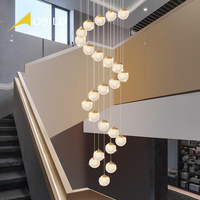 Nouveau style de lustre suspendu multi-têtes en fil métallique sphérique pour restaurant, luminaire LED créatif et personnalisé pour villa et escalier