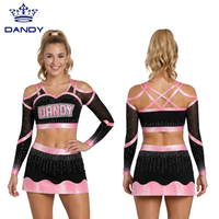 Uniforme de cheerleading personnalisé noir turquoise à manches longues en maille, épaules dénudées, avec strass, dos croisé, haut court et jupe à ourlet ondulé